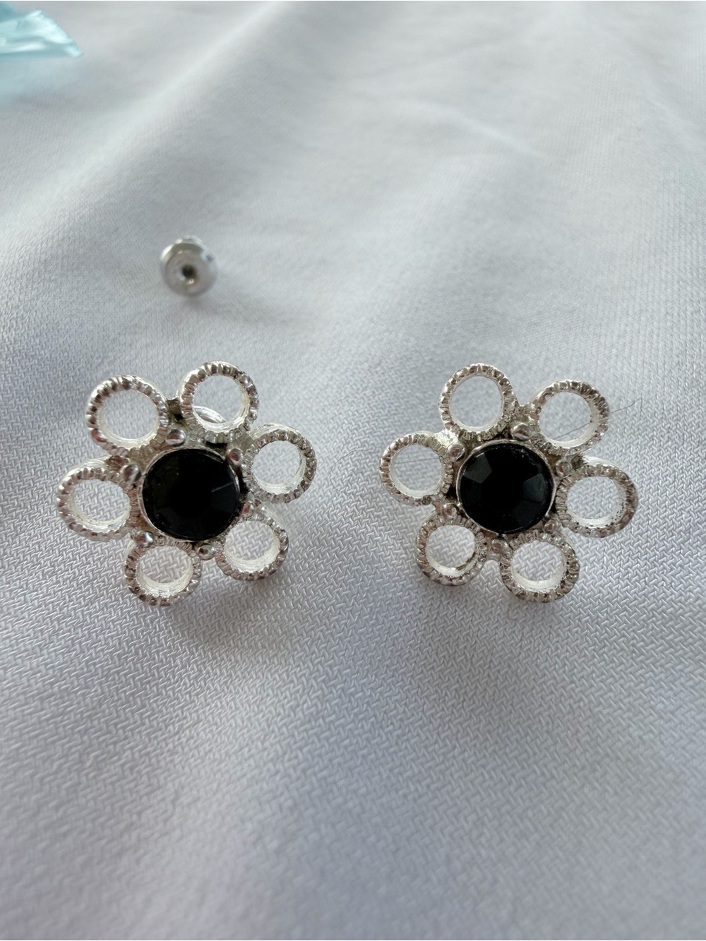 Silver Floral Stud Earrings with Black Center Gem